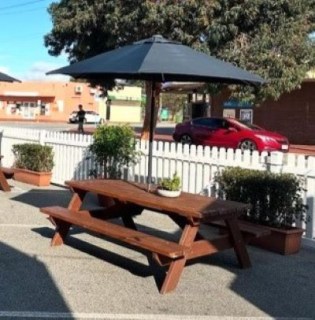 Picnic table with umbrella at Perth wedding